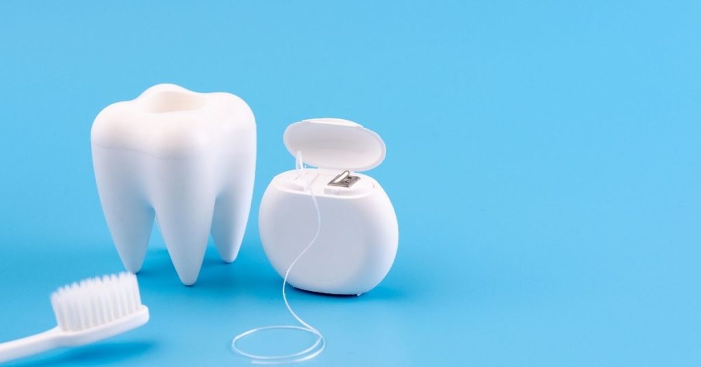 Dental Warranty Blog about Oral Care and Flossing - some benefits of flossing